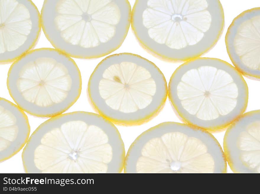 Group lemon slices close to the light.