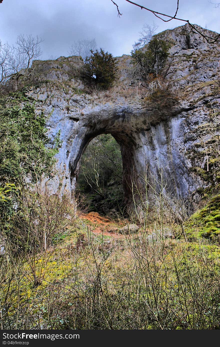 Arch Formed In A Rockface