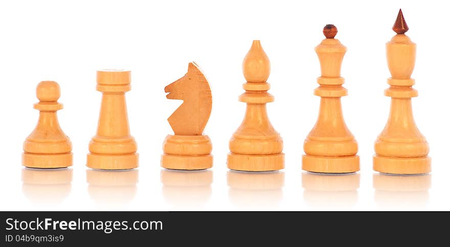 Chess. a group of white wooden chess pieces on a white background