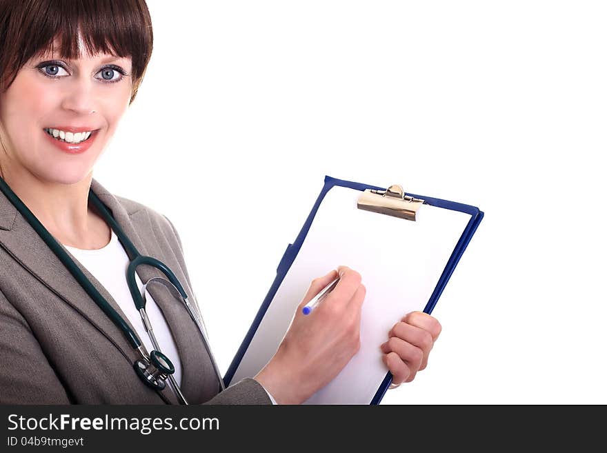 Image of a young doctor writing notes for a patient