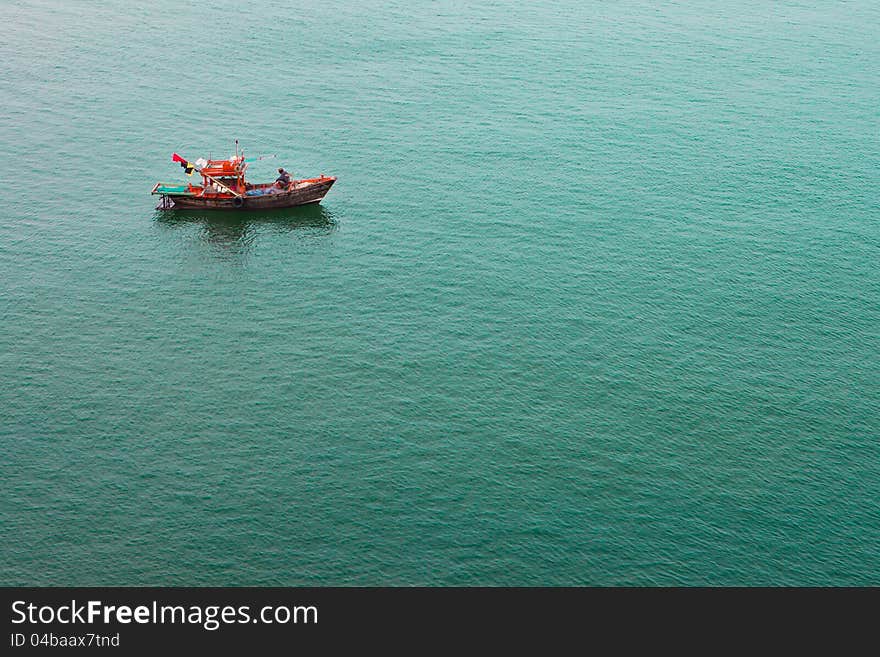 Fisherman sitting on a boat