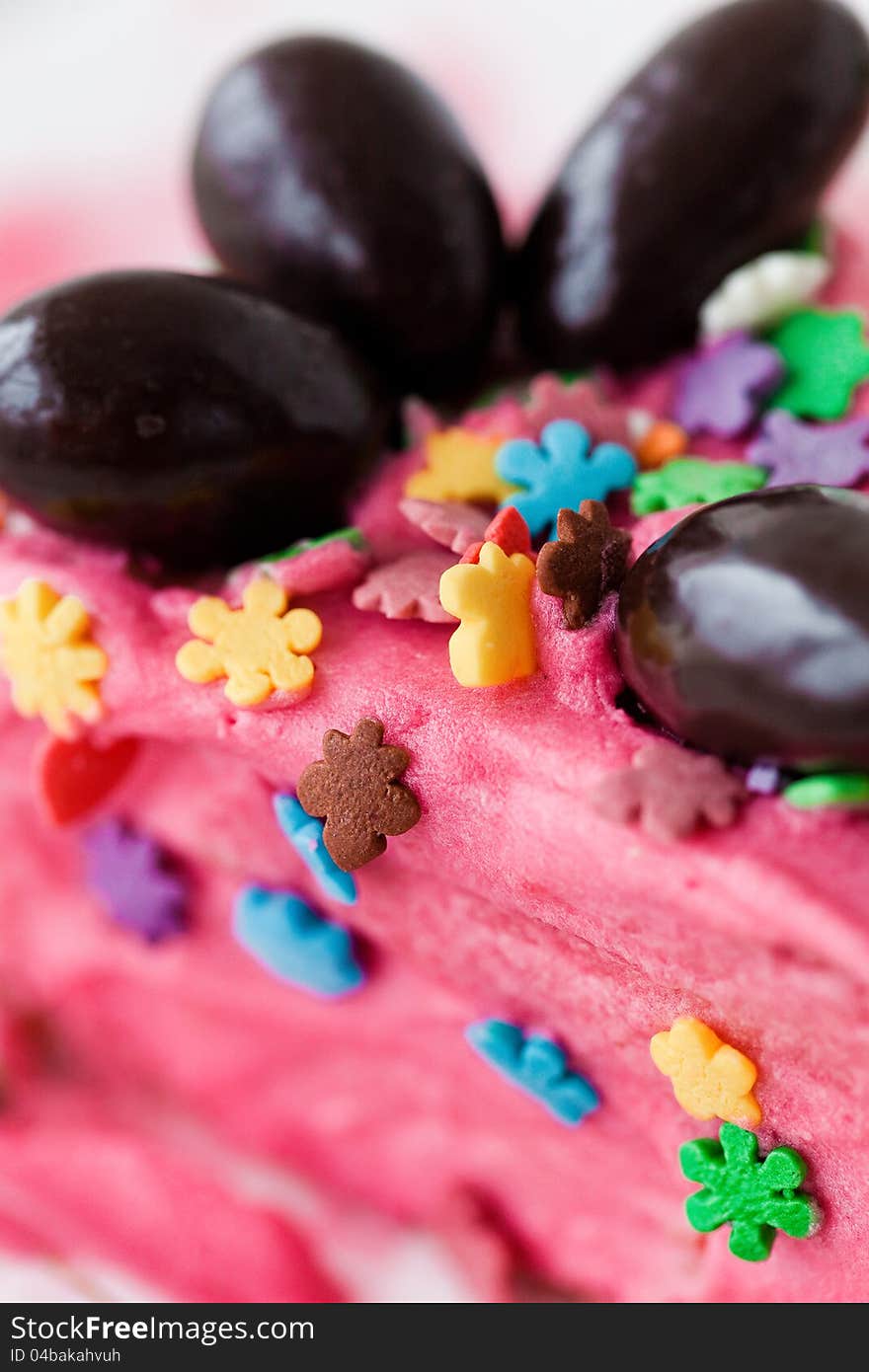 Colorful sprinkles on a cake