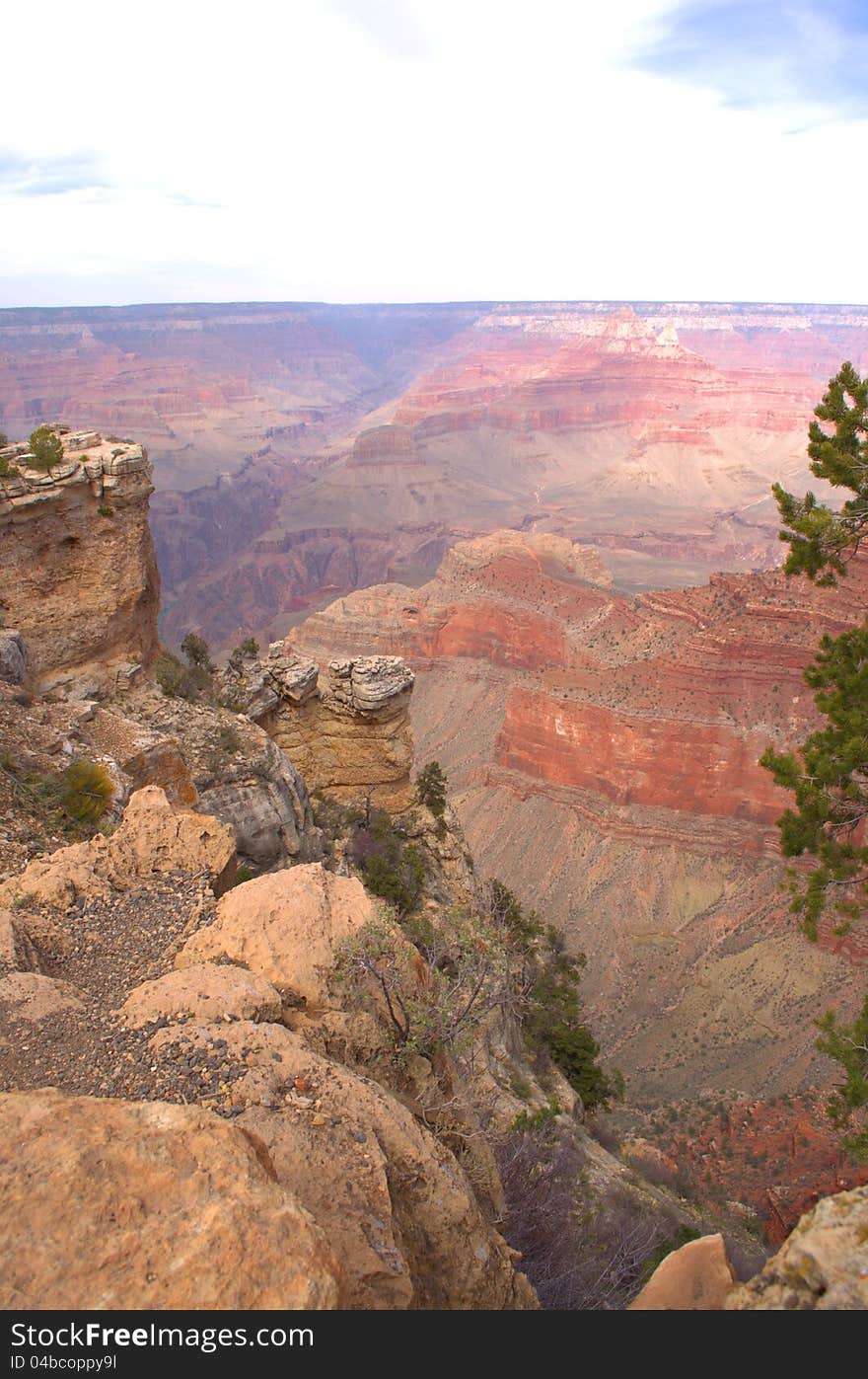 A view into the depth of the Grand Canyon. A view into the depth of the Grand Canyon.