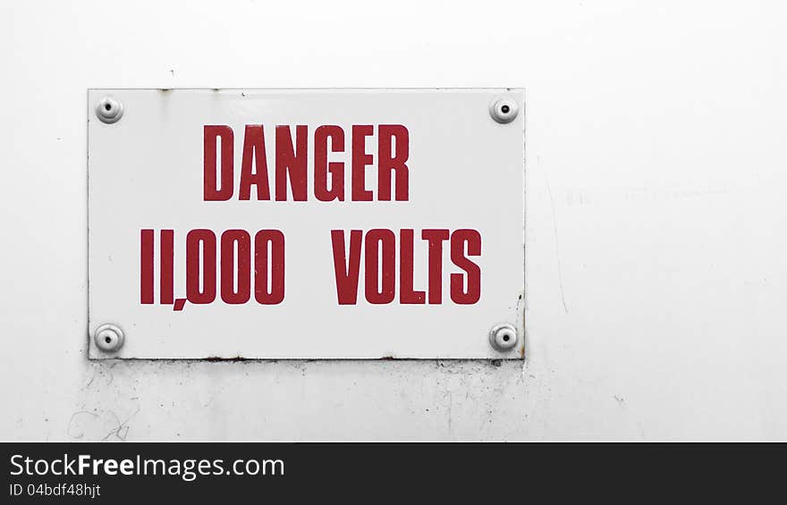 Warning sign on electrical box advertising danger. Warning sign on electrical box advertising danger.