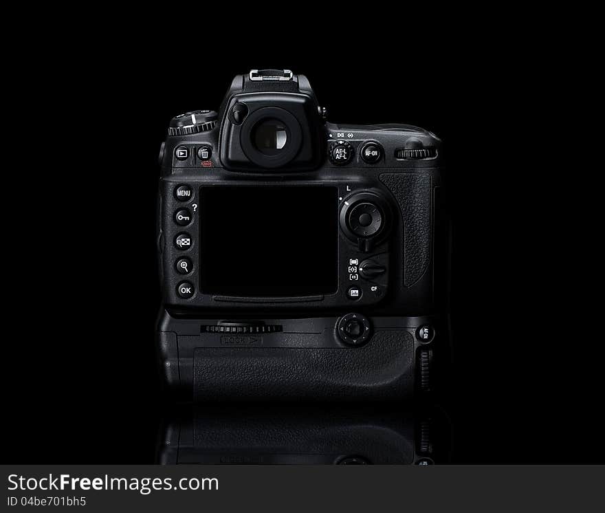 Digital SLR camera isolated on black background with clipping path for the screen