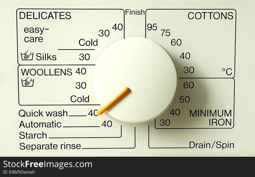 A close up of washing machine programs