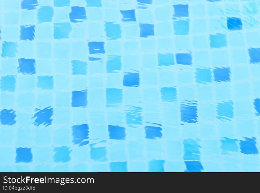 Various color tone aqua blue tile random in pool water. Various color tone aqua blue tile random in pool water