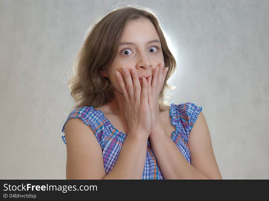 Scared girl in blue dress