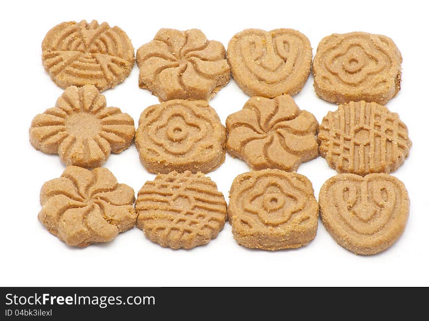 Different forms of biscuits isolated on white