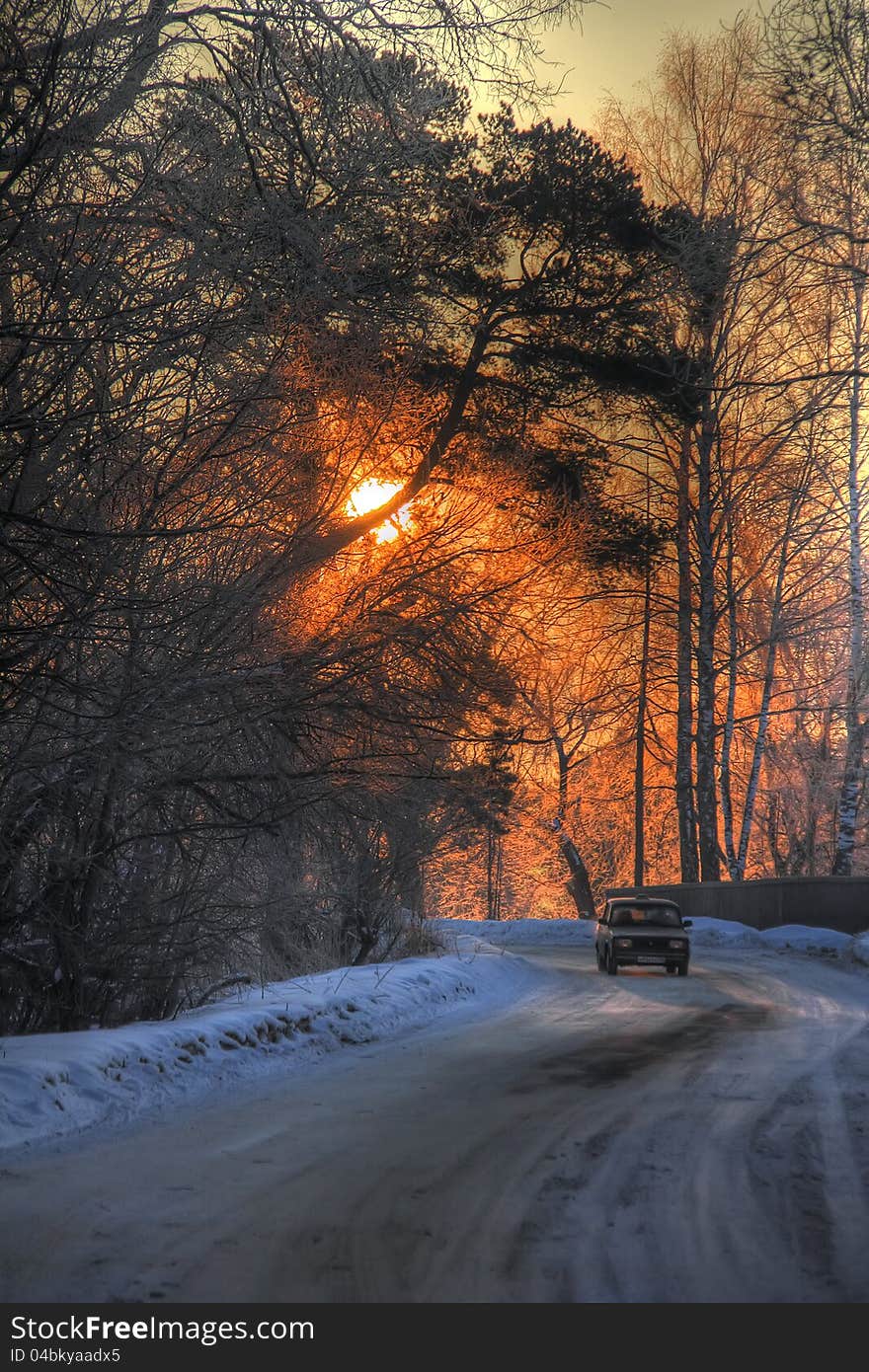 Winter road. Sunrise.