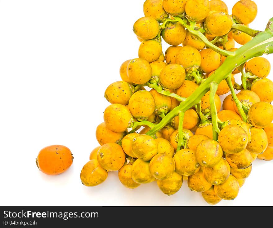 Ripe areca nut on a white background. Ripe areca nut on a white background.