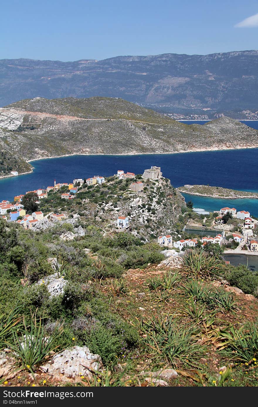 The harbour of the Greek island of Meis. Showing why this is the Turquise coast with the caslte on the hill. The harbour of the Greek island of Meis. Showing why this is the Turquise coast with the caslte on the hill