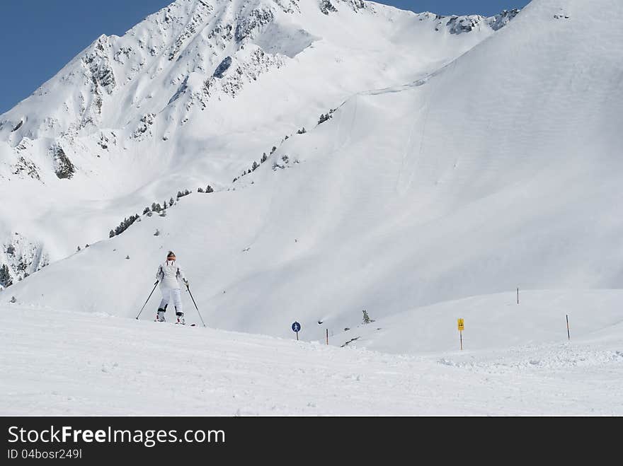 Skier on mountain in Alps