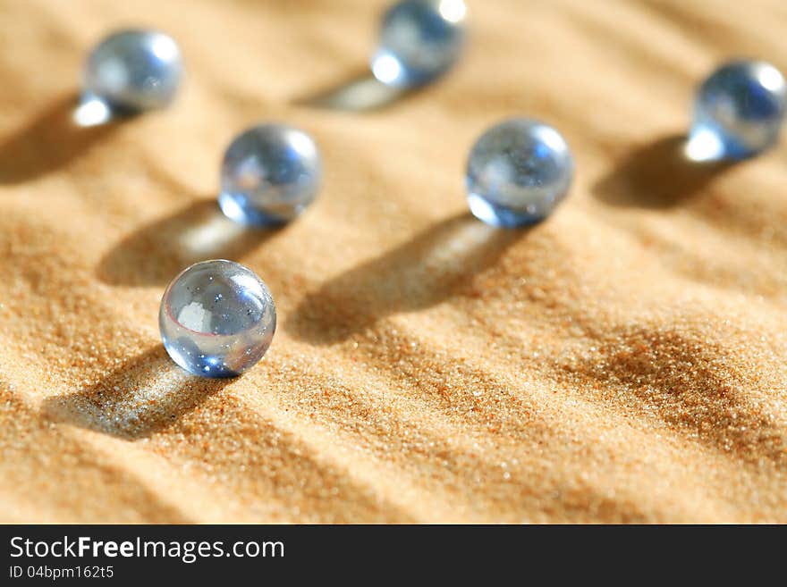 Glass Balls In Sand