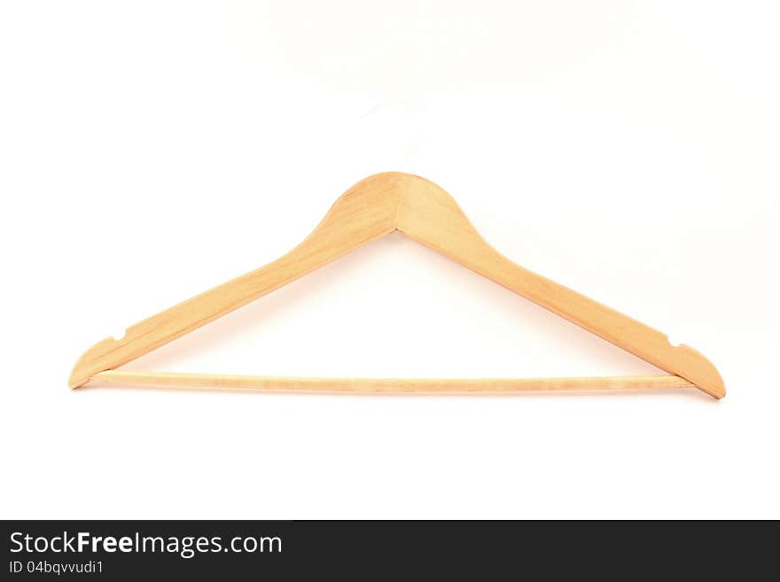 Subject wooden hanger isolated on a white background. Subject wooden hanger isolated on a white background.