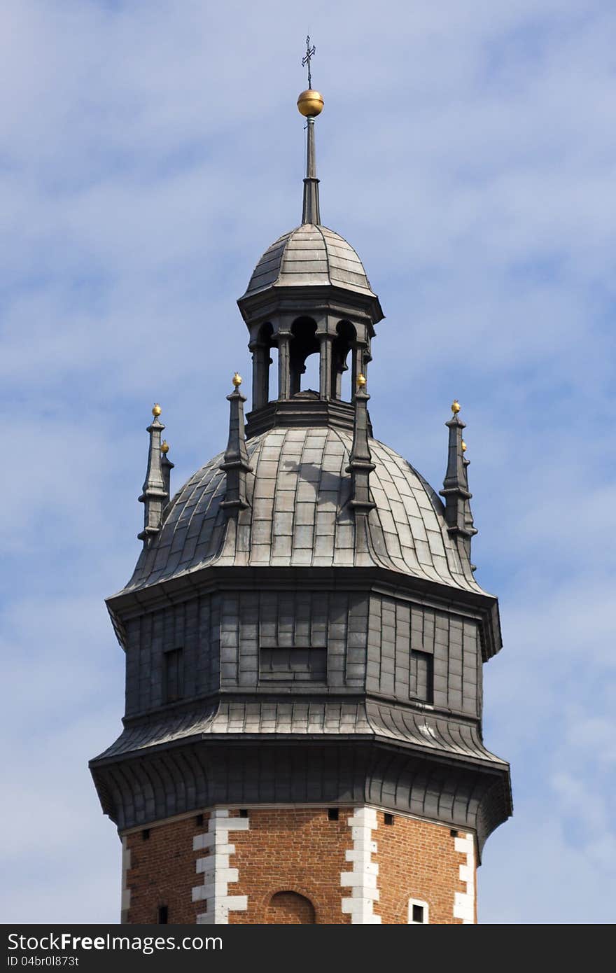 Church tower in the blue sky