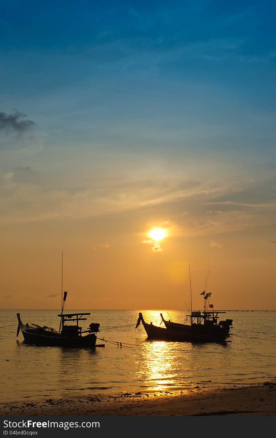 Long tailed boat at sunset Phangnga Thailand. Long tailed boat at sunset Phangnga Thailand