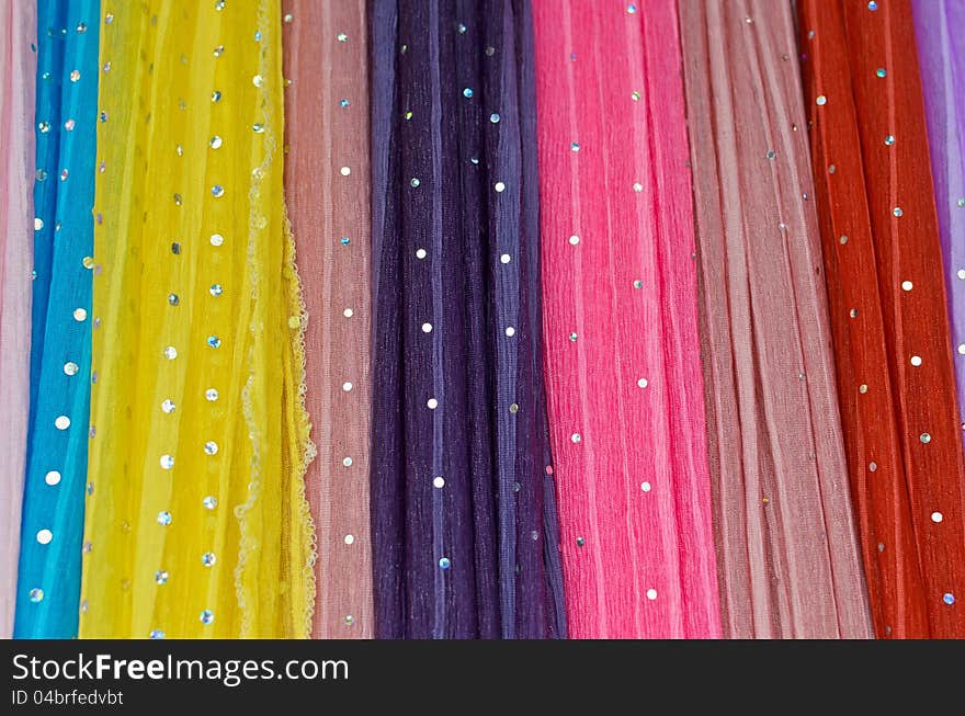 Colorful fabric with sparkling dot pattern