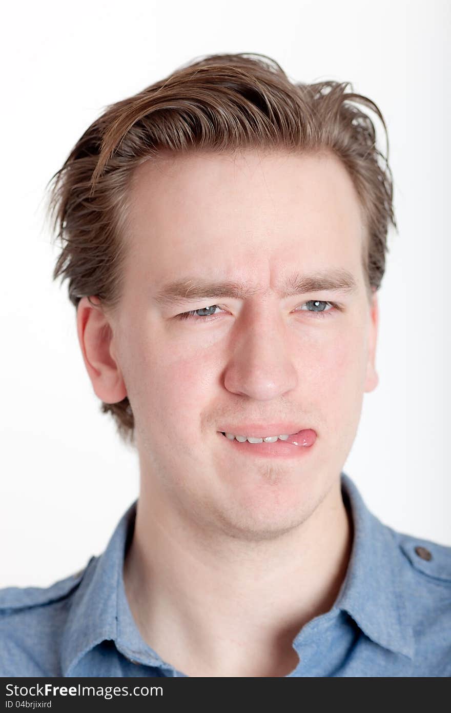 Portrait of the young man on a light background. Portrait of the young man on a light background