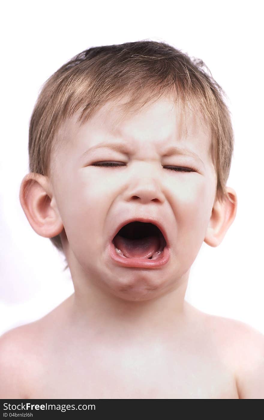 Crying baby boy isolated on white, close up