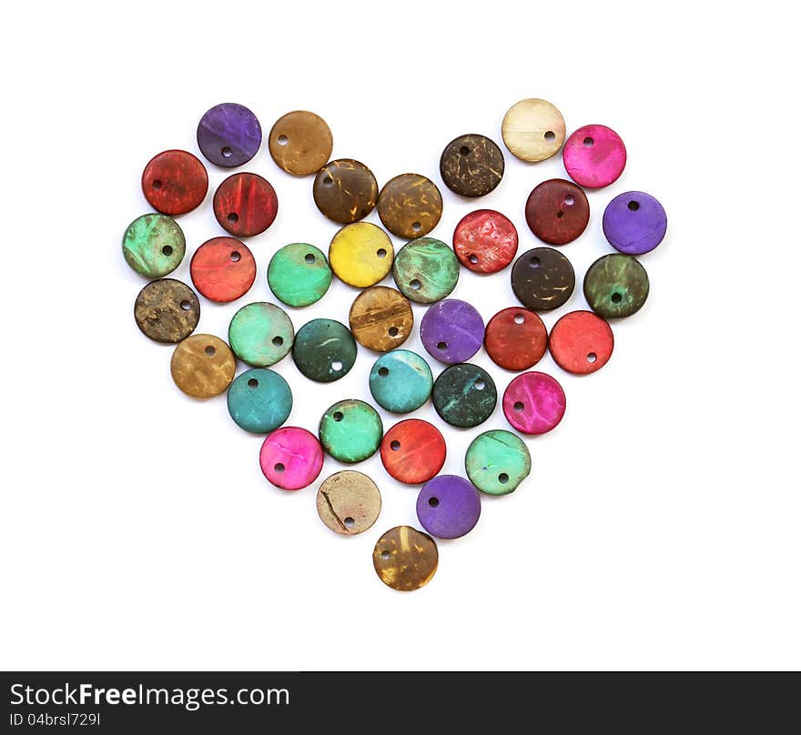 Pattern of heart shape from old colorful beads. Pattern of heart shape from old colorful beads