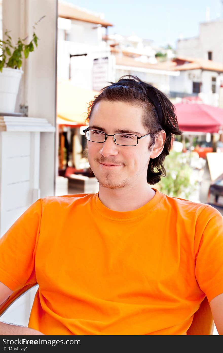 Closeup portrait of a handsome young man smiling. Closeup portrait of a handsome young man smiling