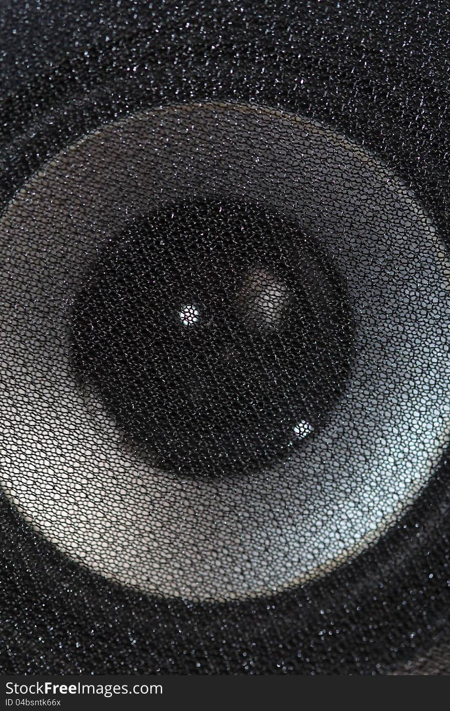 Macro of a black speaker cone