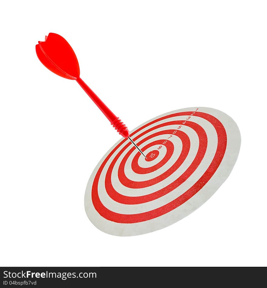 Red dart hit the center of dartboard. Red dart hit the center of dartboard