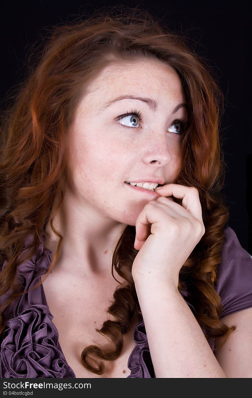 Young Pensive Girl Looking Up