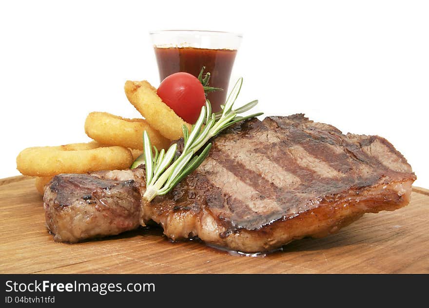 Steak sauce and greens on a white background. Steak sauce and greens on a white background