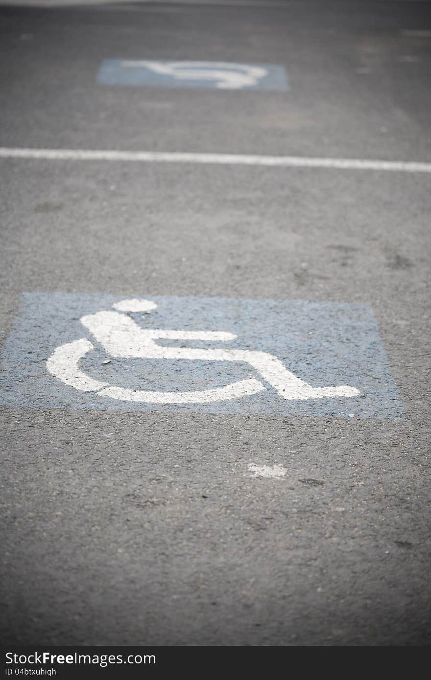 Handicap sign in an empty parking