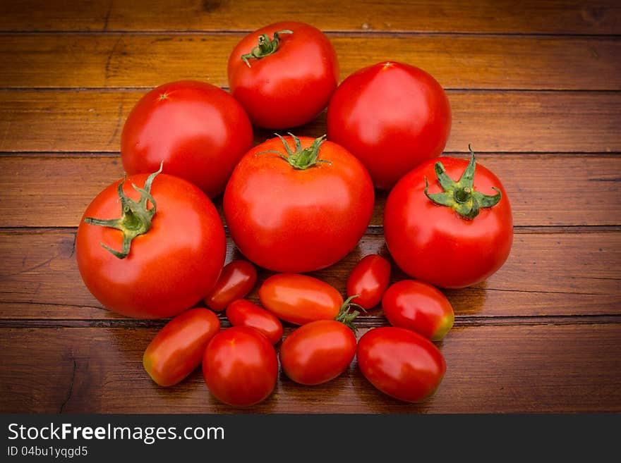 Ripe, tasty, juicy tomatoes on the table