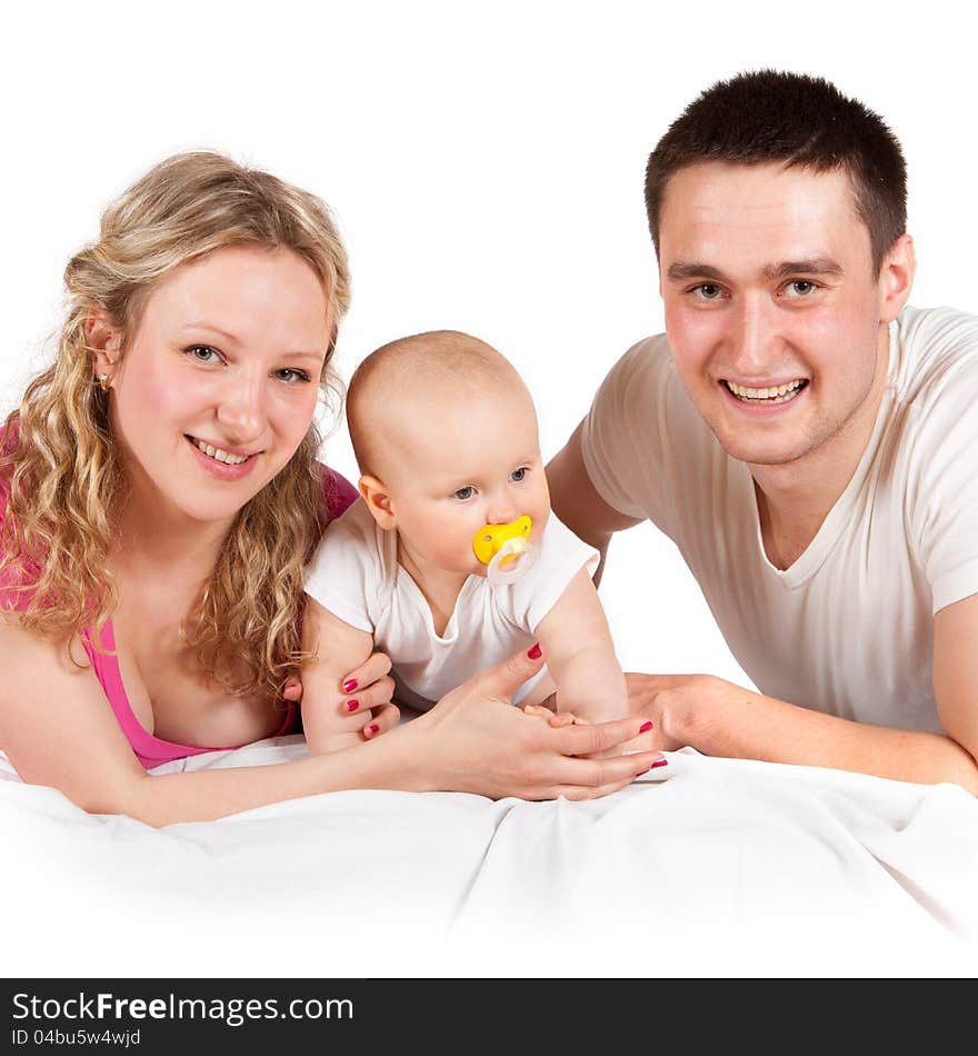 The mother and father a child on a white background. The mother and father a child on a white background