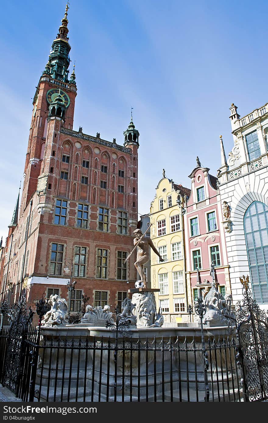 Famous fountain of the Neptune with the ball, against town hall in old Gdansk - the host of the Euro 2012. Famous fountain of the Neptune with the ball, against town hall in old Gdansk - the host of the Euro 2012.