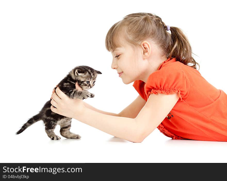 Girl lying with British kitten