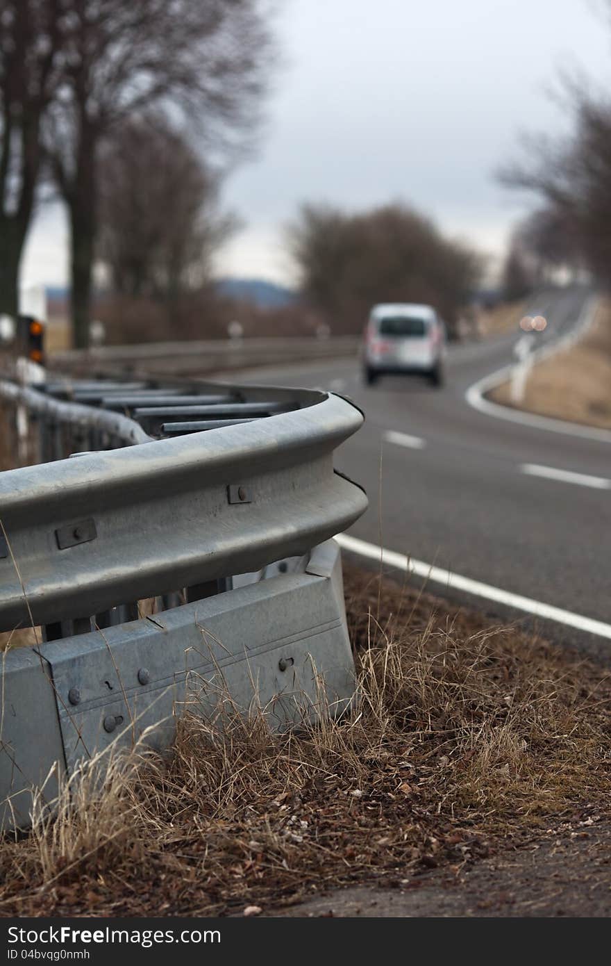 Country road with crash barrier