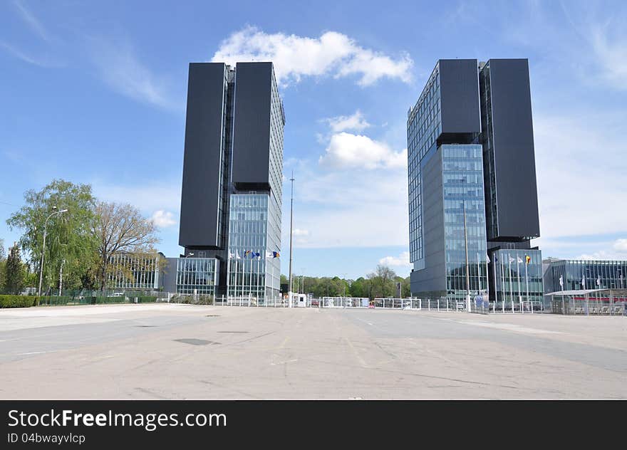 Twin towers in front of Baneasa exhibition center in Bucharest - the capital of Romania. Twin towers in front of Baneasa exhibition center in Bucharest - the capital of Romania