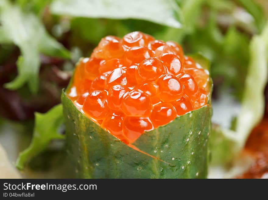 Red caviar with seafood and herbs