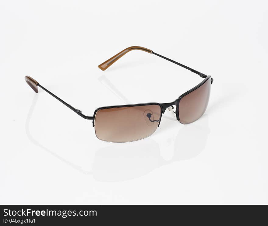 Sunglasses with reflection in white background