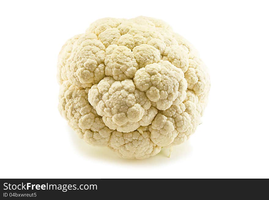 Head of raw cauliflower on white