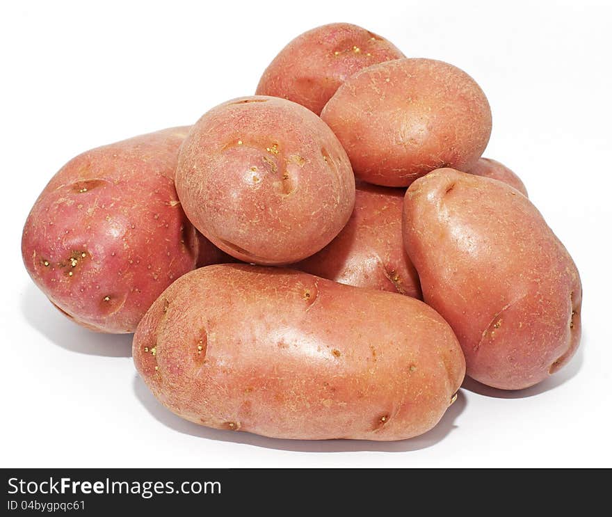 A small pile of red Desiree Potatoes that are excellent as fries and as roast potatoes. A small pile of red Desiree Potatoes that are excellent as fries and as roast potatoes.