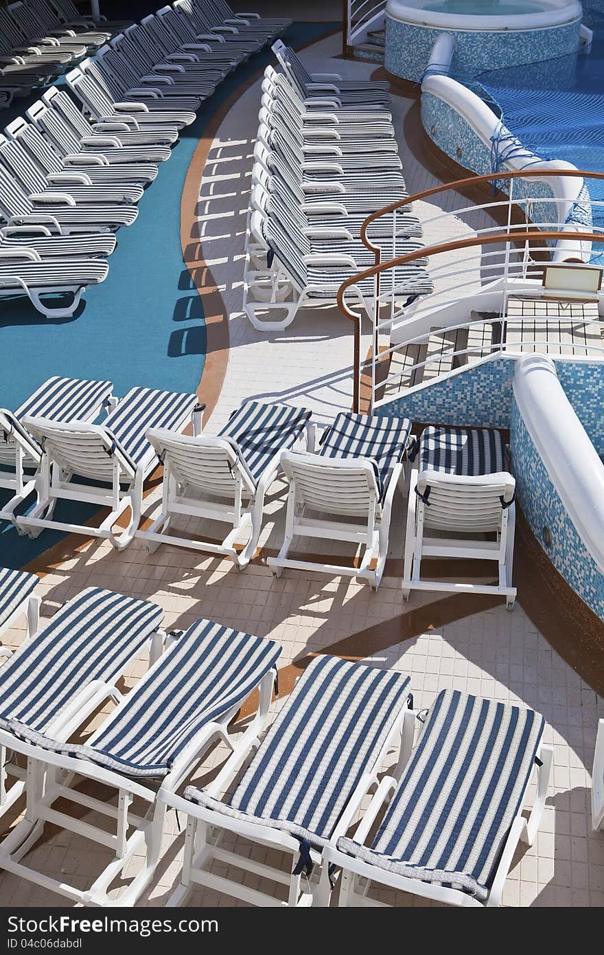 Roe of deck chairs on sundeck of the cruise ship