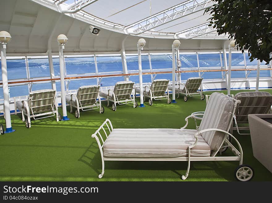 Sunbeds on sundeck of the cruise ship