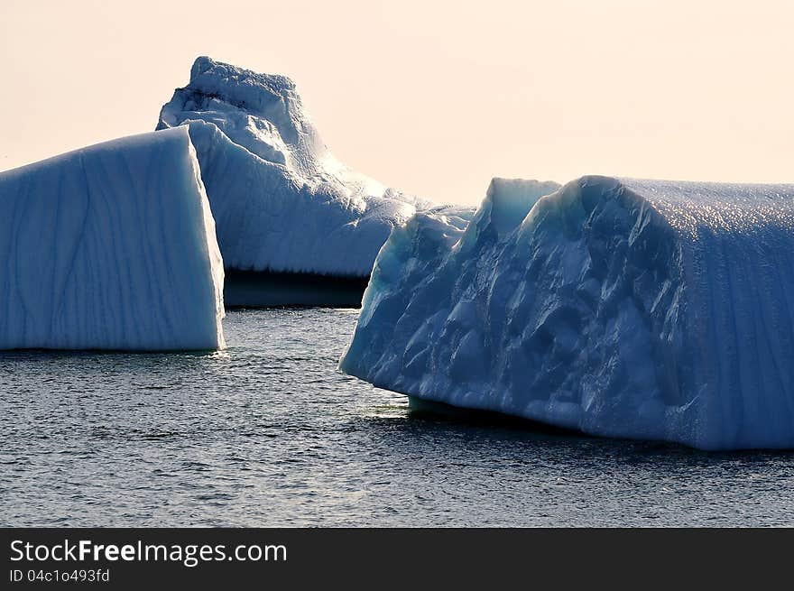 Dramatic image depicting the shear size of these iceberg pieces near Quidi Vidi which is a small coastal community just outside of St. John's Newfoundland. Dramatic image depicting the shear size of these iceberg pieces near Quidi Vidi which is a small coastal community just outside of St. John's Newfoundland.