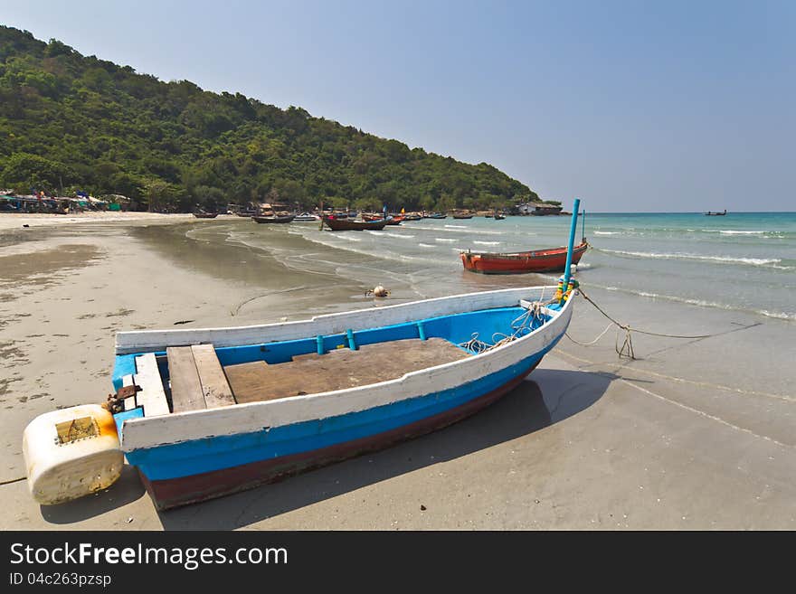 Small boat at  the beach in thailand