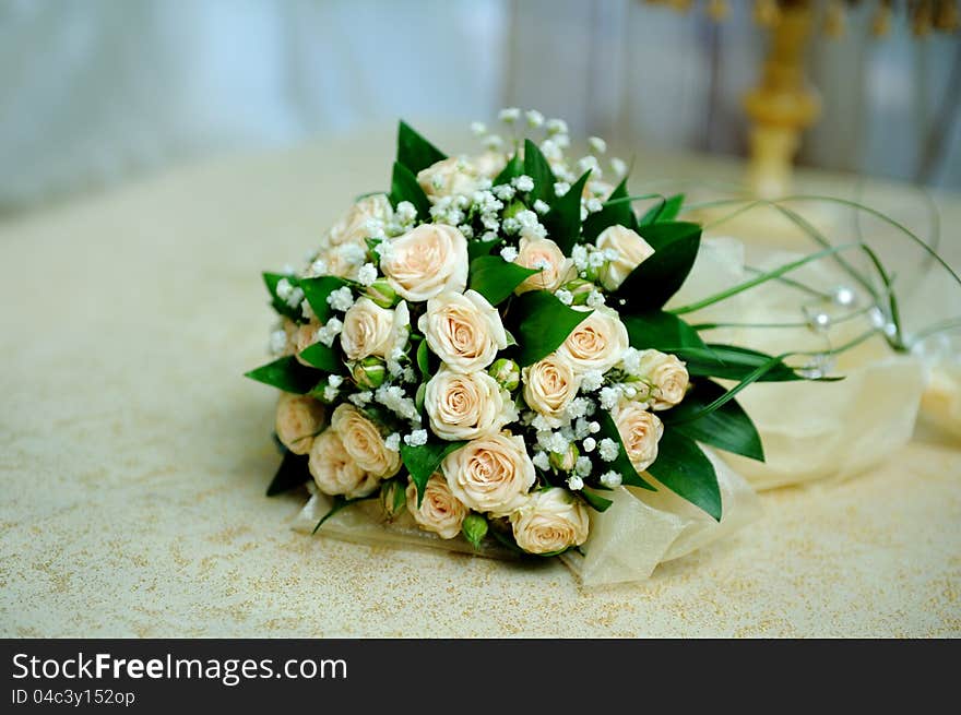 Wedding bouquet of roses on a white background. Wedding bouquet of roses on a white background