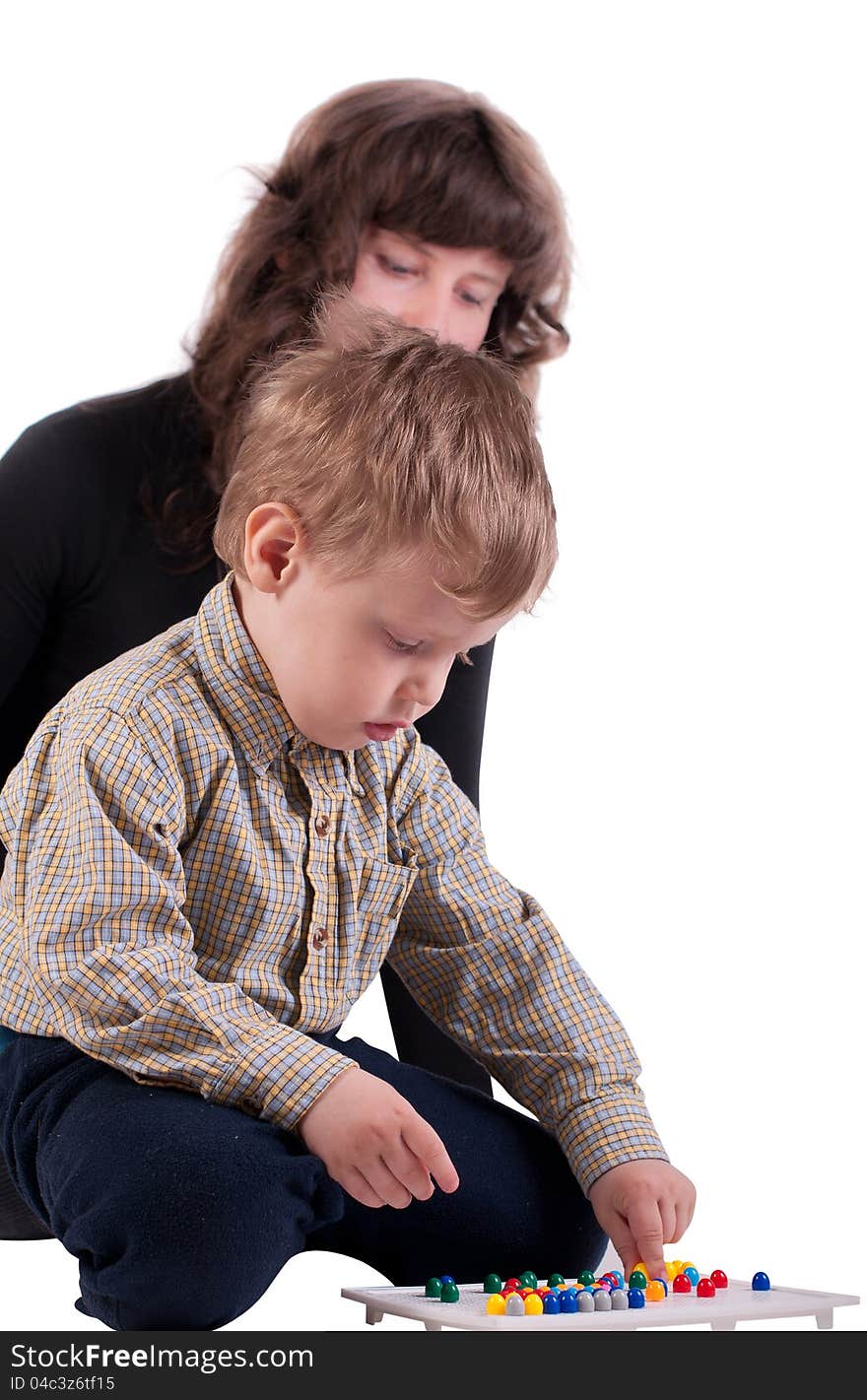 Mom plays with her son, isolated on white