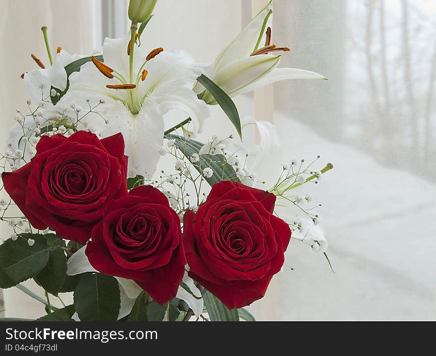 White lily and red rose on marriage