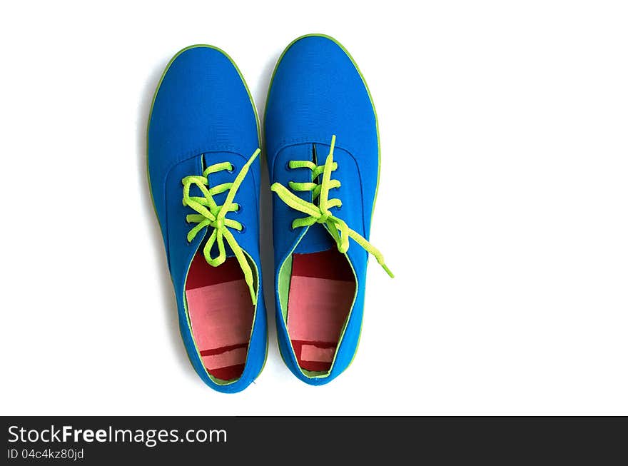 Pair of blue with green rope sneaker on white background. Pair of blue with green rope sneaker on white background