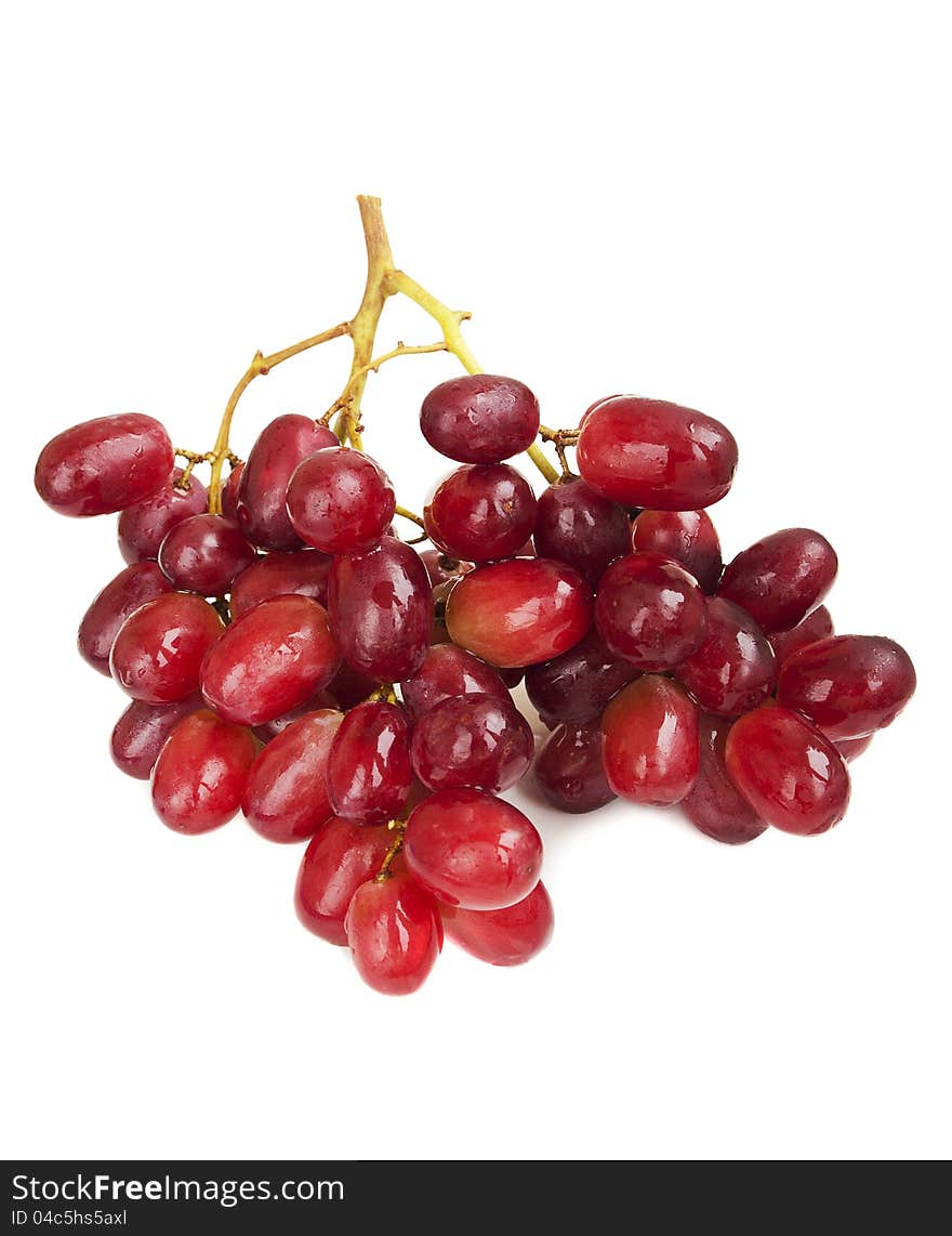 Red seedless grapes on a white background. Red seedless grapes on a white background